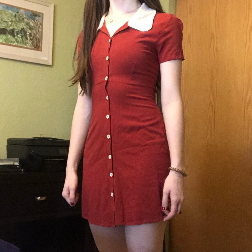 Adorable rust orange dress with Peter Pan collar.